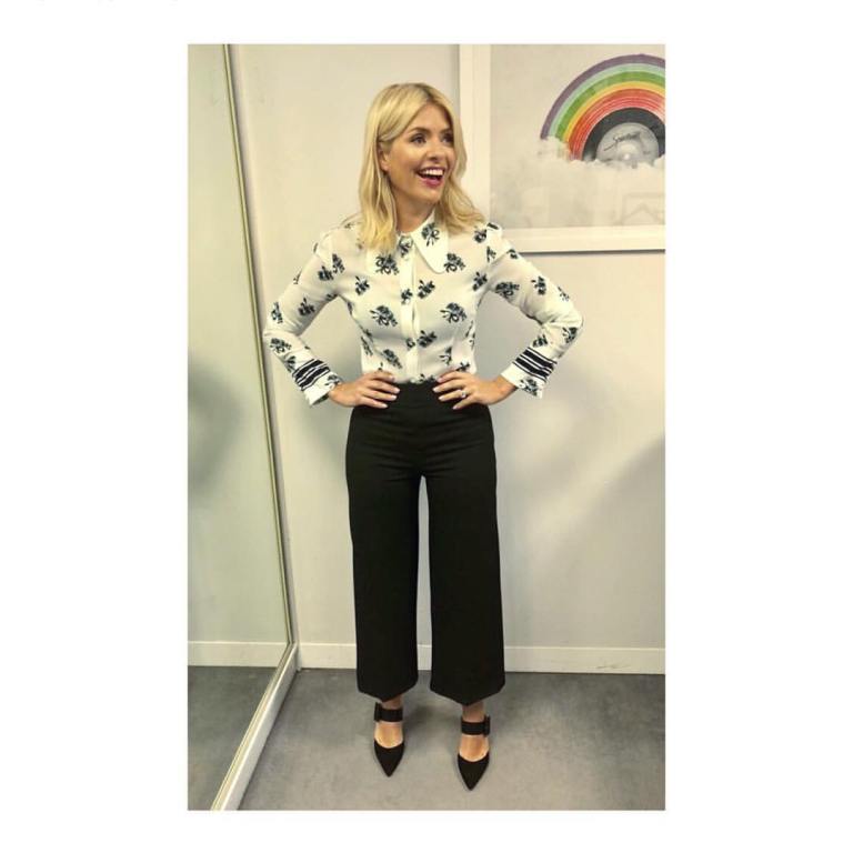 Holly Willoughby outfit white and black floral shirt black trousers This Morning January 2018 photo Angie Smith