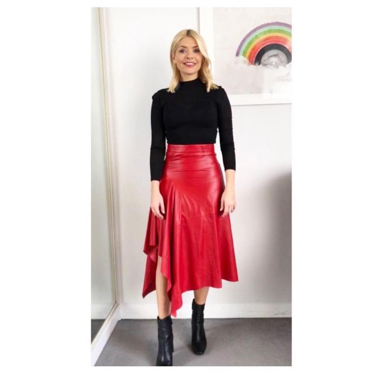Holly Willoughby This Morning outfit red leather skirt black polo neck black ankle boots February 2018