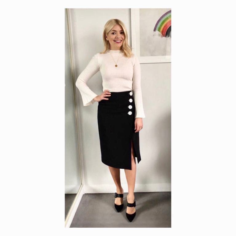 Holly willoughby This Morning outfit cream flare sleeve jumper black skirt white buttons black mules MArch 2018