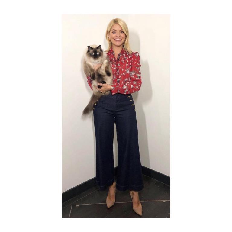 Holly Willoughby this Morning outfit style red floral shirt navy button trousers nude court shoes April 2018