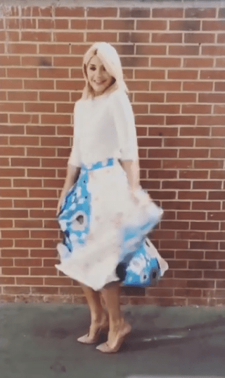 Holly Willoughby This Morning style blue floral skirt white top pink court shoes May 2018