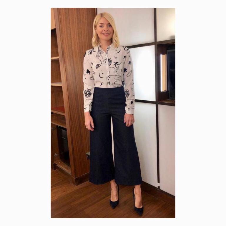 where to get Holly Willoughby This Morning outfit today ivory grphic print shirt blue denim cropped trousers February 2019 photo Holly Willoughby