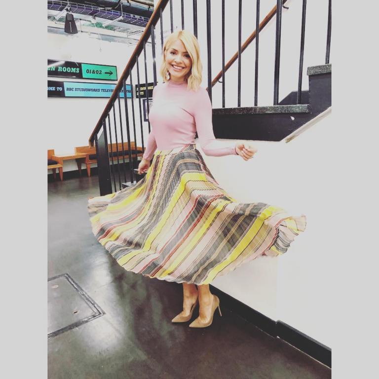 where to get Holly Willoughby This Morning outfit today yellow grey pleated skirt pink top nude court shoes MArch 2019 photo Holly Willoughby