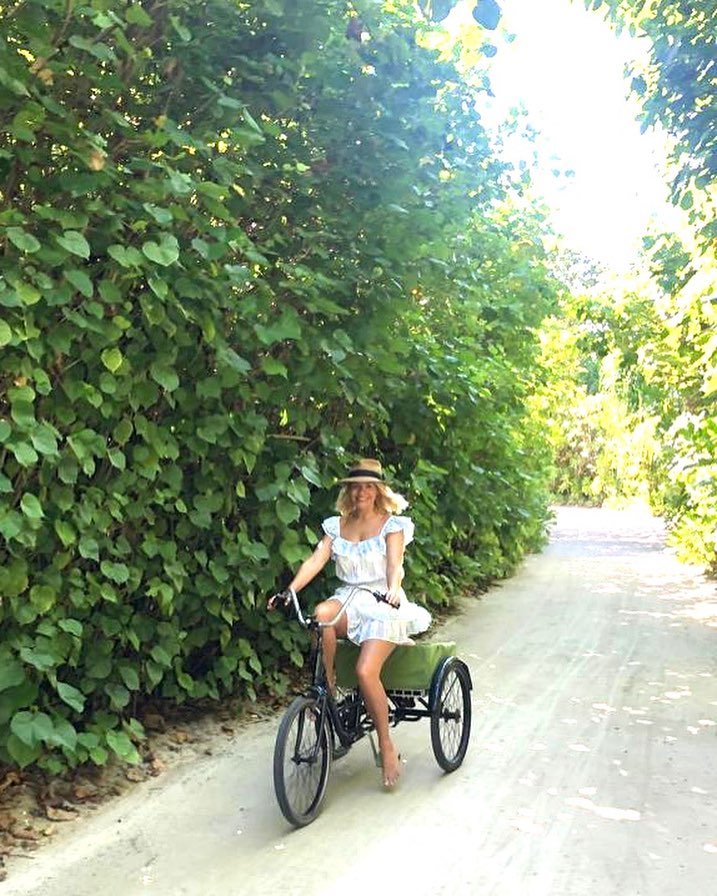 where to get Holly Willoughby on a tricycle blue and white ruffle dress April 2019 photo Holly willoughby