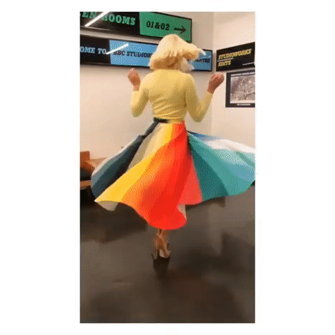 How to find holly Willoughby This Morning outfit today rainbow pleated skirt yellow knit nude suede court shoes July 2019