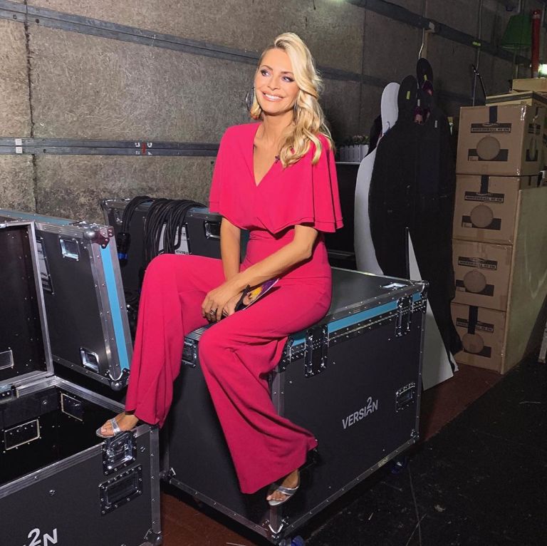 how to find Tess Daly pink cape jumpsuit silver sandals Strictly October 2019 Photo James Yardley