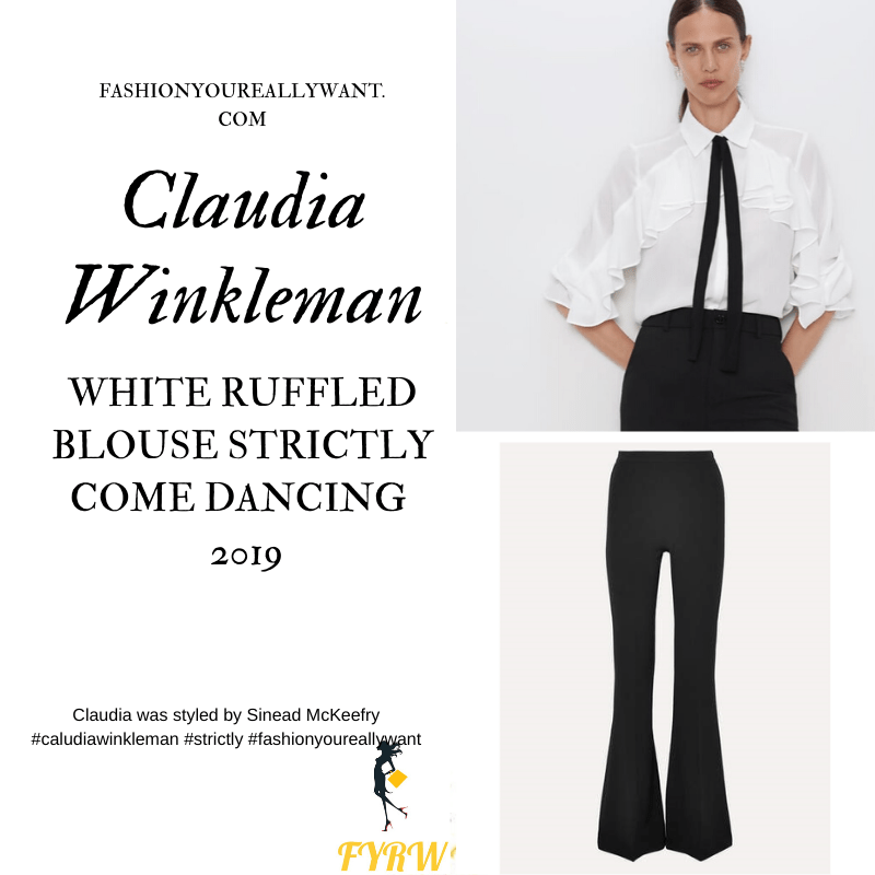 Claudia Winkleman wore This white ruffled blouse with black tie black flared trousers on the Strictly Come Dancing Final 2019 December