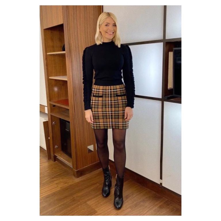 where to get all Holly Willoughby This Morning outfits orange check skirt black knit black ankle boots 21 January 2020 Photo Holly Willoughby