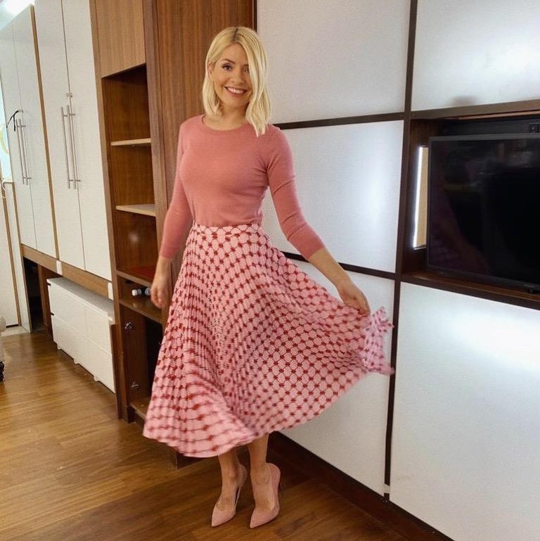 where to get all Holly Willoughby This Morning outfits pink lip print pleated skirt pink knitwear 13 February 2020 Photo Holly Willoughby