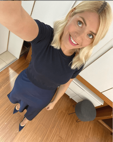 where-to-get-holly-willoughby-this-morning-outfit-navy-short-sleeve-jumper-navy-skirt-21-may-2020-photo-holly-willoughby