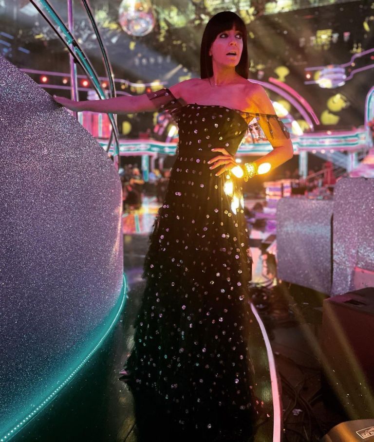 where to get all Claudia Winkleman Strictly dresses black tulle off the shoulder gown gold sequins 19 December 2020 Photo Sinead McKeefry