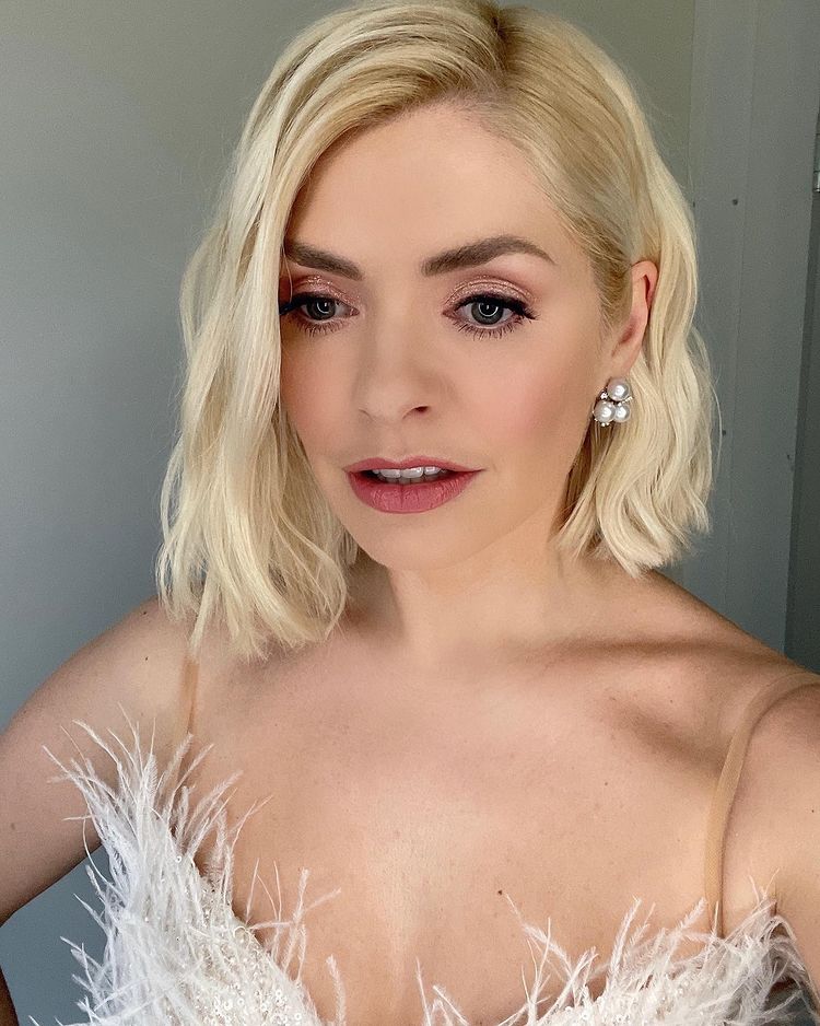 where to get all Holly Willoughby Dancing on Ice dresses white feather gown pearl earrings 14 MArch 2021 Photo Holly Willougby