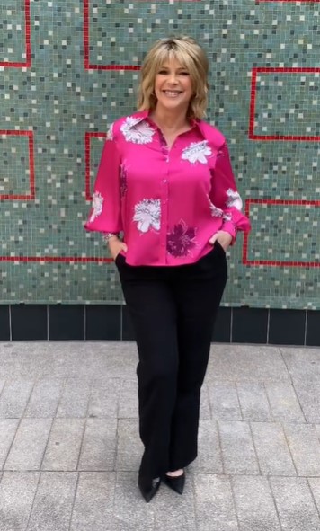 where to get Ruth Langsford This morning outfits pink satin floral blouse black trousers black court shoes 26 July 2021 Photo Ruth Langsford