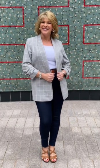 where to get all Ruth Langsford This Morning outfits grey checked blazer blue top blue skinny jeans tan sandals 26 August 2021 Photo Ruth Langsford