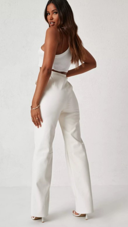 dani michelle x missguided cream faux leather trousers back view