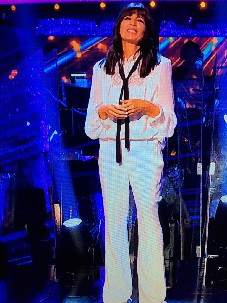 where to get all Claudia Winkleman Strictly outfits white lace pussybow blouse white trousers week 1 25 September 2021 Photo BBC