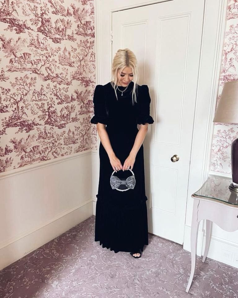 where to get all Holly Willoughby dresses black velvet short sleeve maxi dress black bow bag black suede sandals 26 September 2021 photo Holly Willoughby