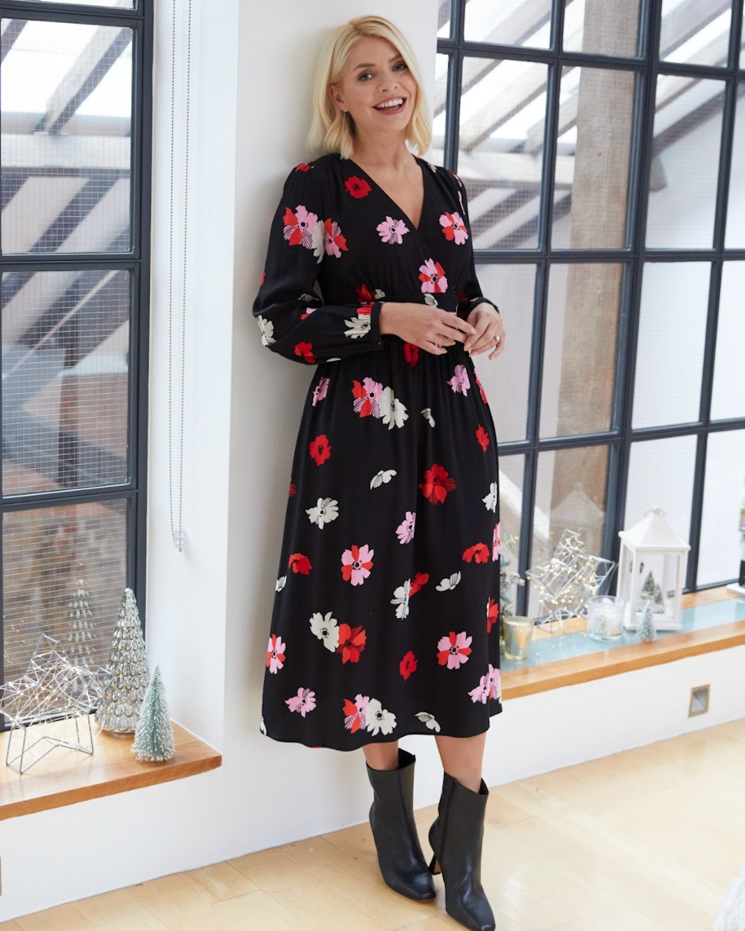 where to get all Holly Willoughby dresses black V neck floral tea dress black ankle boots 15 November 2021 photo M&S