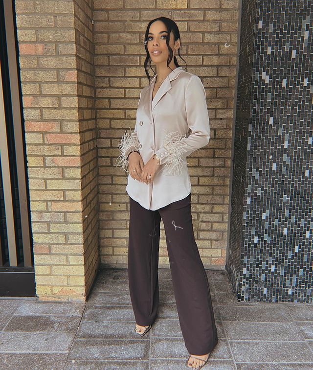where to get all Rochelle Humes This Morning outfits cream satin jacket with feathers brown trousers silver sandals 15 December 2021 Photo Rochelle Humes
