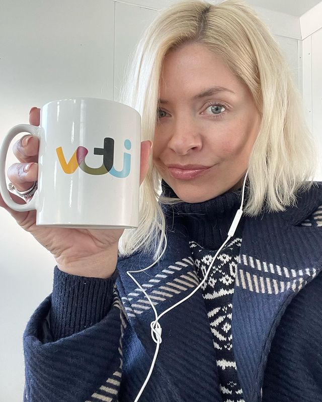 where to get all holly Willoughby Dancing on Ice outfits navy and white check tartan coat navy and white icelandic jumper 16 January 2022 Photo Holly Willoughby