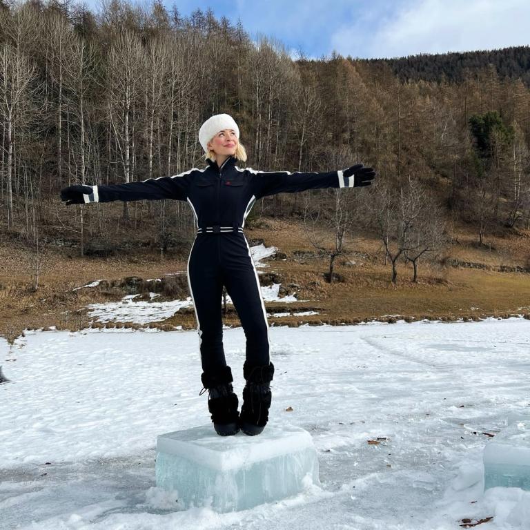 where to get all holly willoughby outfits black white stripe ski suit white fur hat black ski moon boots Freeze The Fear Photo Holly willoughby