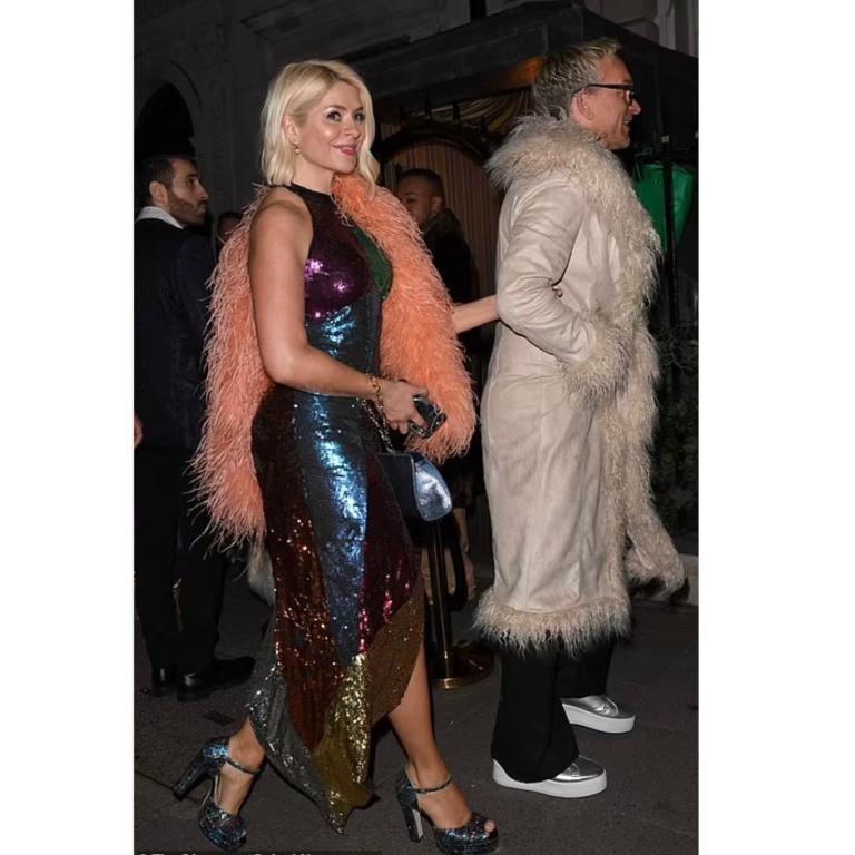 where to get all Holly Willoughby outfits orange feather boa sequin dress silver bag 10 March 2022 Photo Terry De Havilland