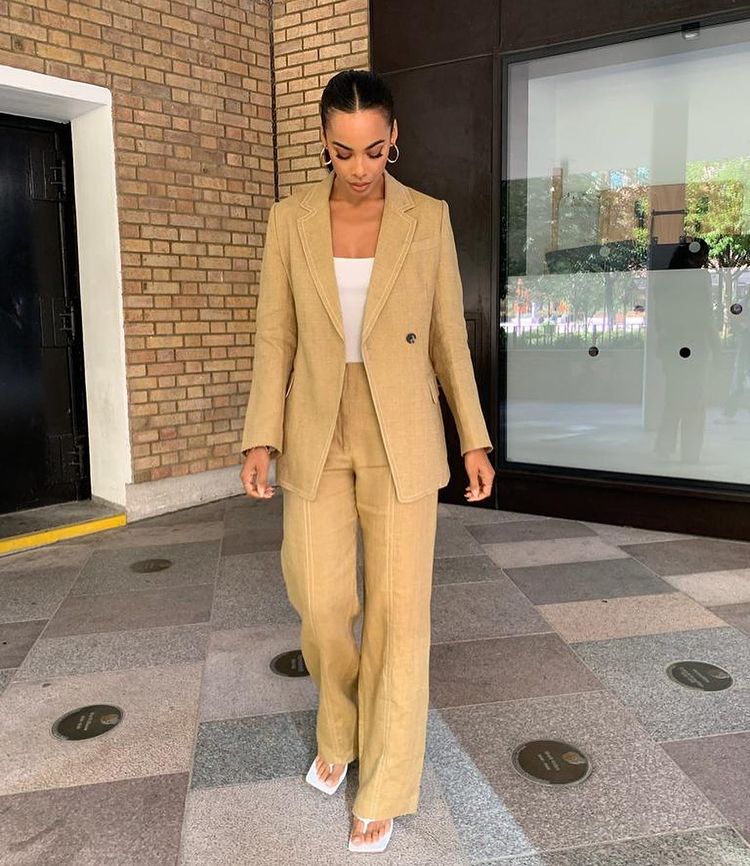 where to get all Rochelle Humes This Morning outfits beige neutral linen trouser suit white top white toe thong mules 31 August 2022 Photo Amber Jackson