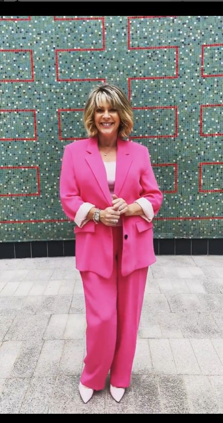 where to get all Ruth Langsford This Morning outfits fuchsia pink trouser suit pink top pink court shoes 22 August 2022 Photo Ruth Langsford
