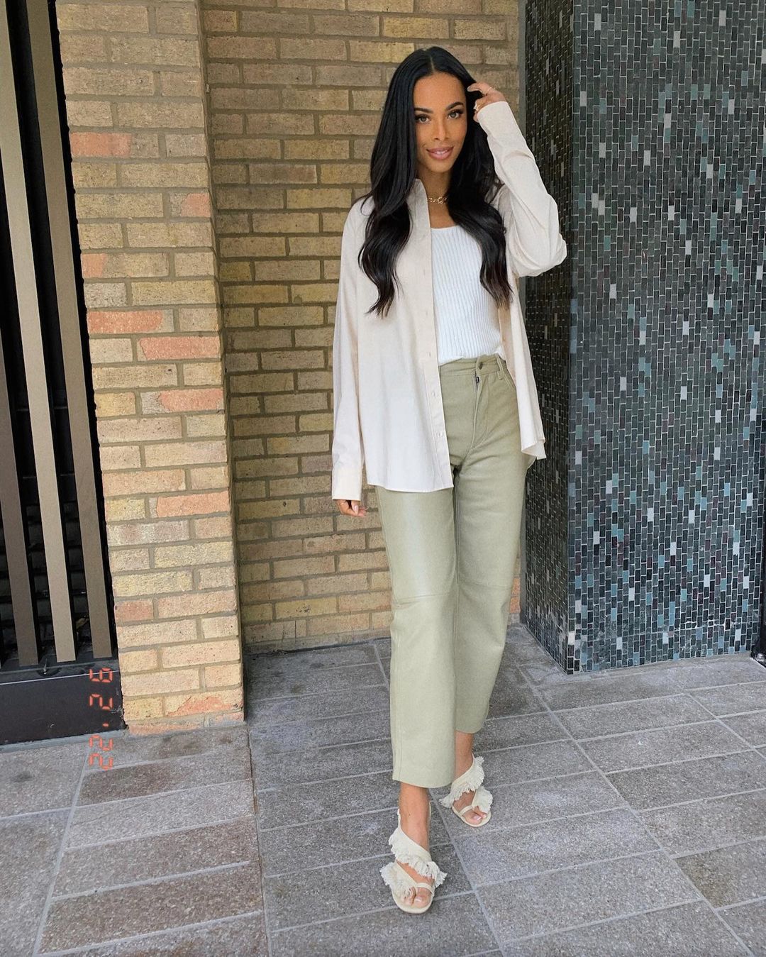 where to get all Rochelle Humes This Morning outfits khaki green faux leather trousers white rib op cream shirt fring natural toe thong mules 2 September 2022 Photo Rochelle Humes