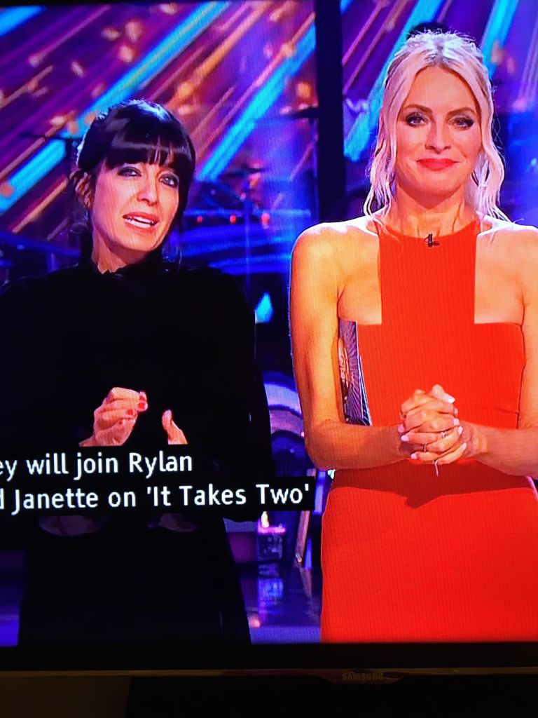 where to get all Claudia Winkleman Strictly come Dancing outfits black velvet ruffle neck mini dress 23 October 2022 Photo BBC