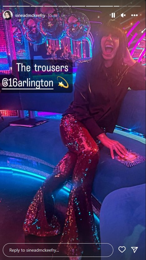 where to get all Claudia Winkleman Strictly Come Dancing outfits red sequin trousers black silk blouse 27 November 2022 Photo Sinead McKeefry
