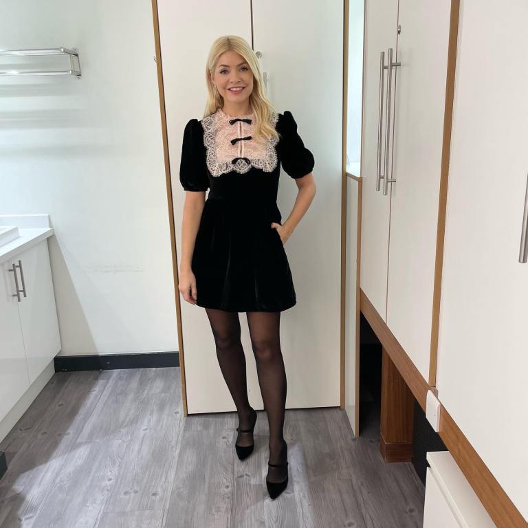 where to get all Holly Willoughby This Morning dresses black velvet mini dress lace front with bows black Mary Jane shoes 22 November 2022 Photo Holly Willoughby