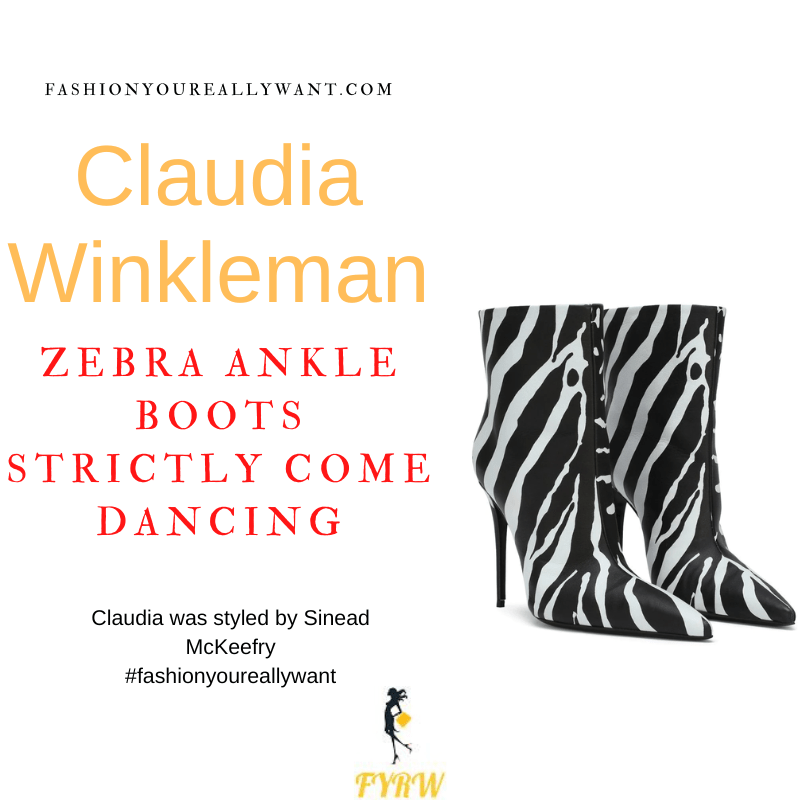 Claudia Winkleman Wore This on Strictly Come Dancing Week 11 Results December 2022 where to get her outfits black satin top black leggings zebra print ankle boots