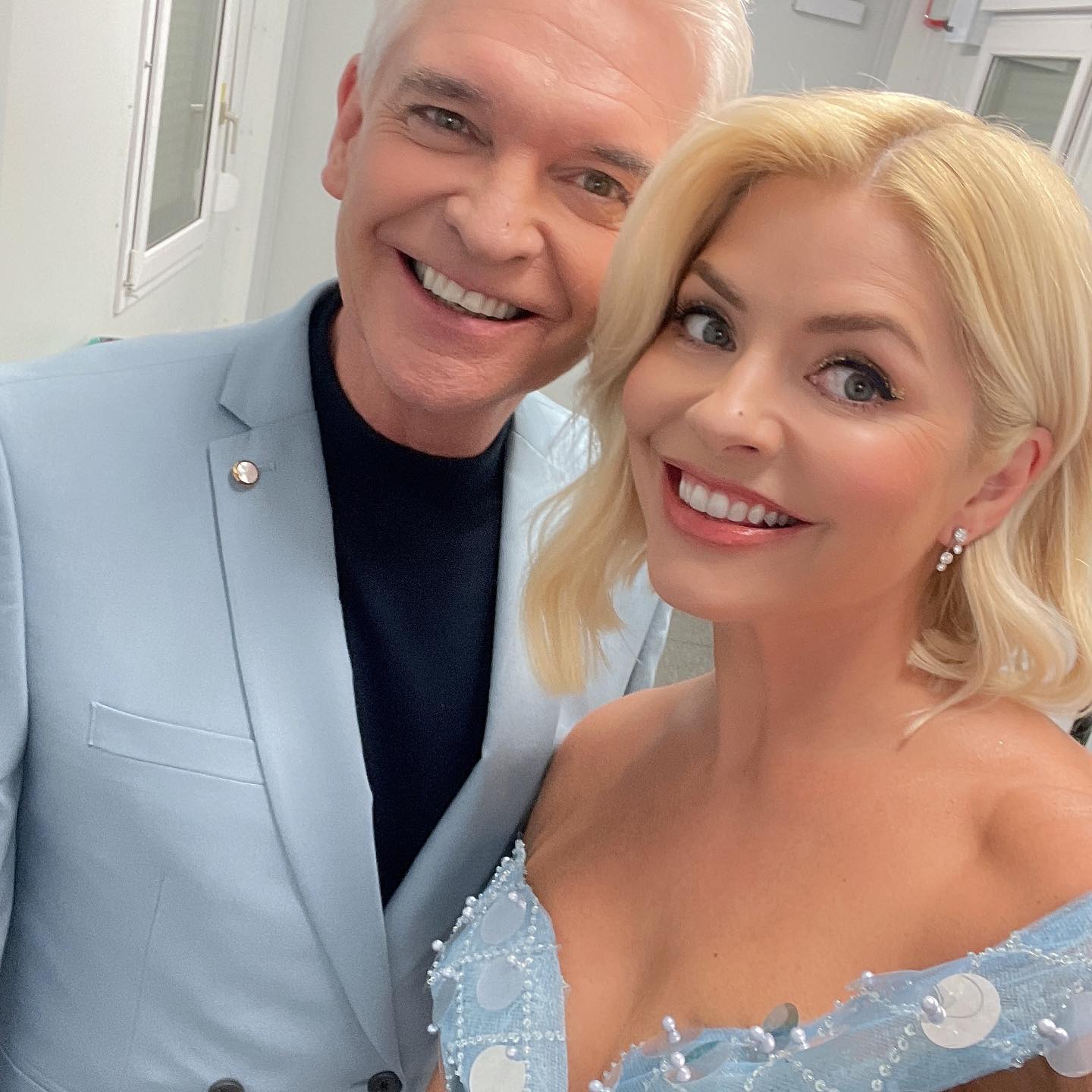 where to get all holly Willoughby Dancing on Ice dresses blue sequin disc strapless gown diamond drop earrings promo pictures Photo Holly Willoughby January 2023