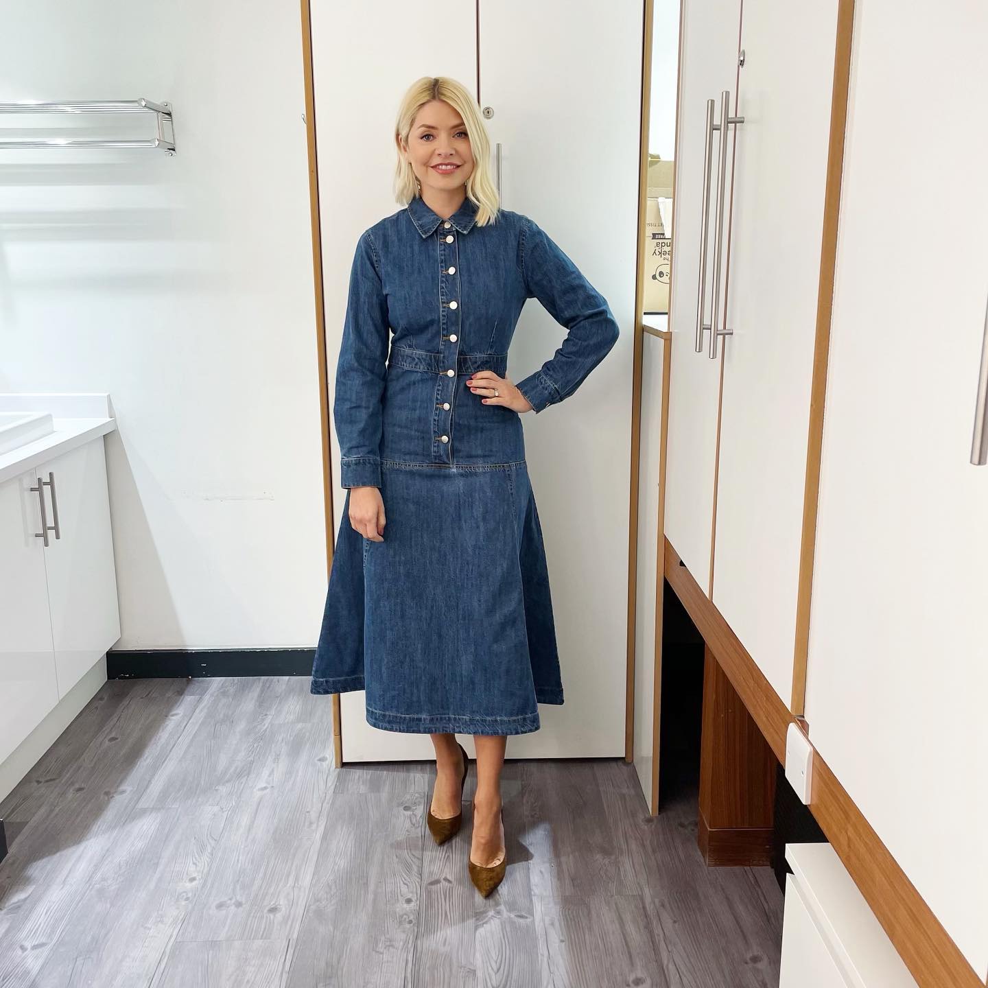 where to get all Holly Willoughby This Morning outfits dresses black and white floral fit and flare dress denim long sleeve midi shirt dress brown suede court shoes 24 January 2023 Photo Holly Willoughby