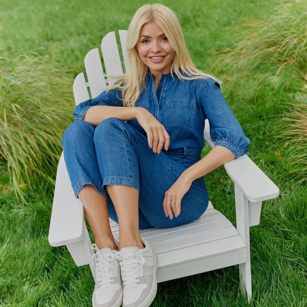 where to get all Holly Willoughby outfits belted denim jumpsuit white and grey trainers 9 February 2023 Photo M&S