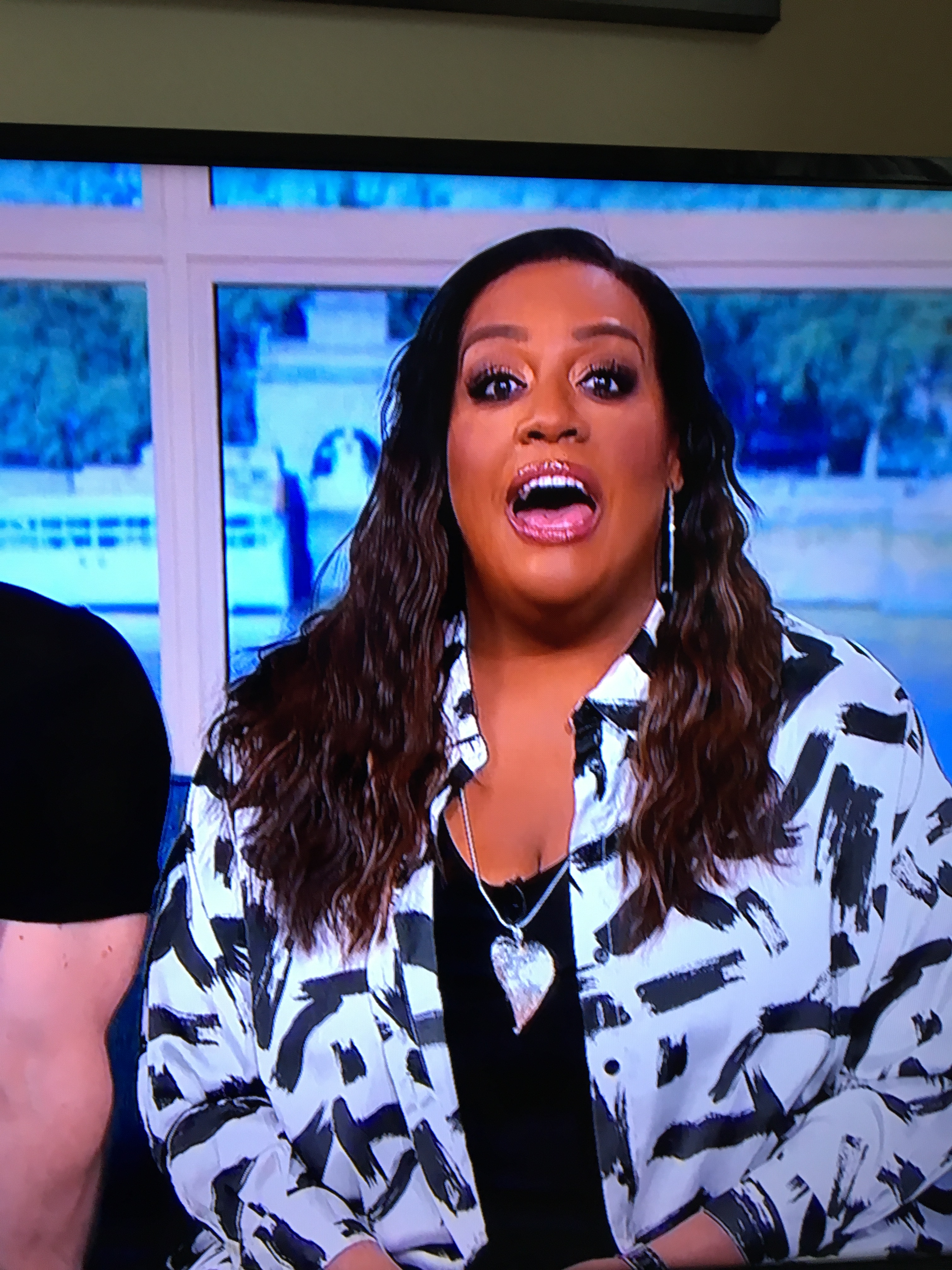 where to get all Alison Hammond This Morning outfits black and white mono print satin shirt and trousers co ord 21 April 2023 photo ITV