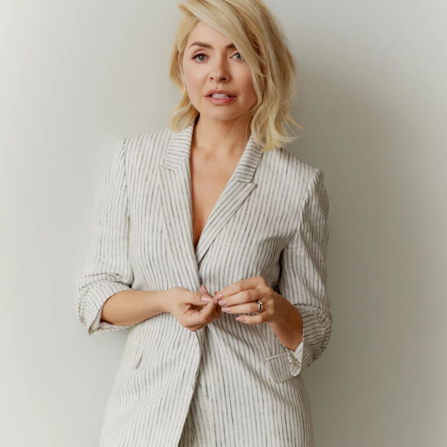 where to get all Holly Willoughby outfits ivory striped blazer and trousers 7 May 2023 Photo M&S