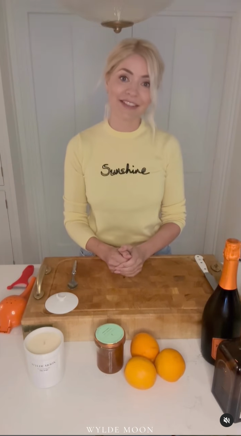 where to get all Holly Willoughby outfits yellow Sunshine sweater Coronation cocktail 6 May 2023 Photo Wylde Moon