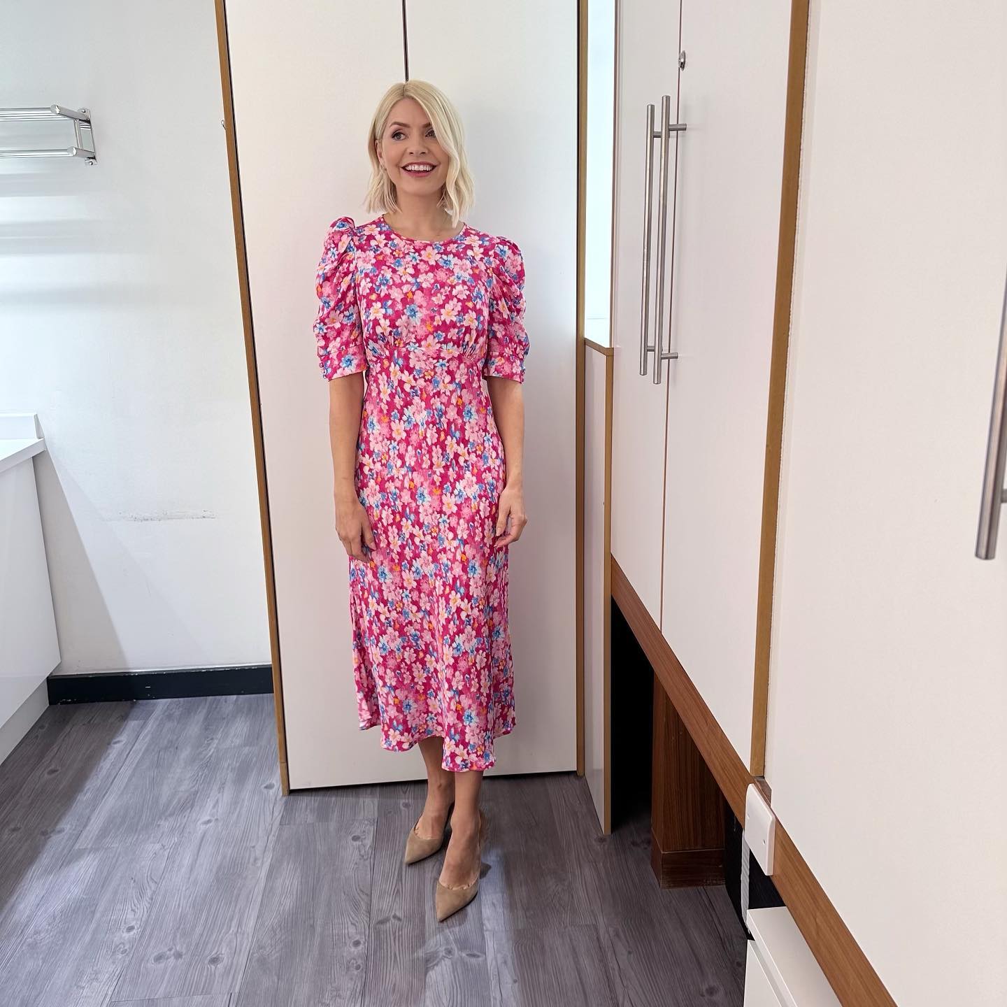 where to get all Holly Willoughby This Morning dresses pink pansy floral short sleeve floral midi dress nude suede court shoes 16 May 2023 Photo Holly Willoughby
