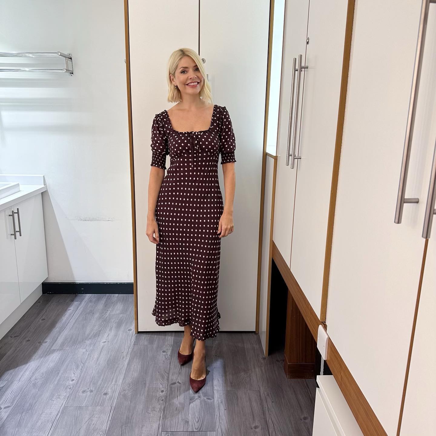 where to get all Holly Willoughby This morning dresses brown polka dot scoop neck midi dress brown suede court shoes 12 September 2023 Photo Holly Willoughby