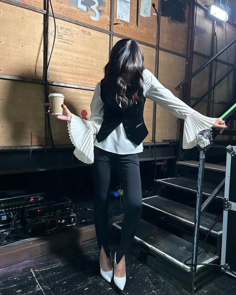 where to get all Claudia Winkleman Strictly Come Dancing outfits white shirt pleated cuff black velvet waistcoat white court shoes 11 November 2023 Photo Claudia Winkleman