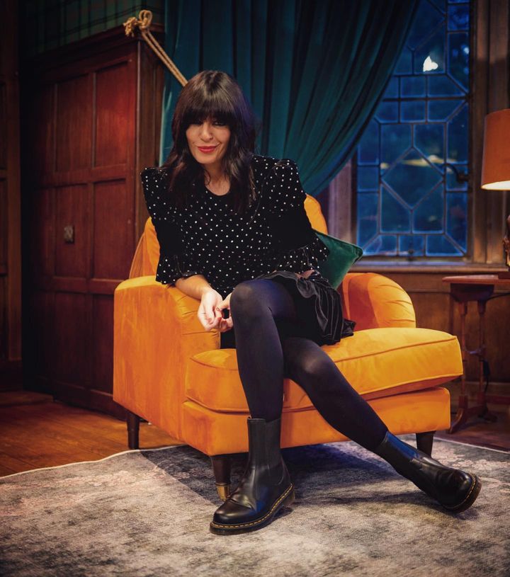 where to get all Claudia Winkleman The Traitors outfits black velvet crystal embellished mini dress black ankle boots 10 January 2024 photo BBC