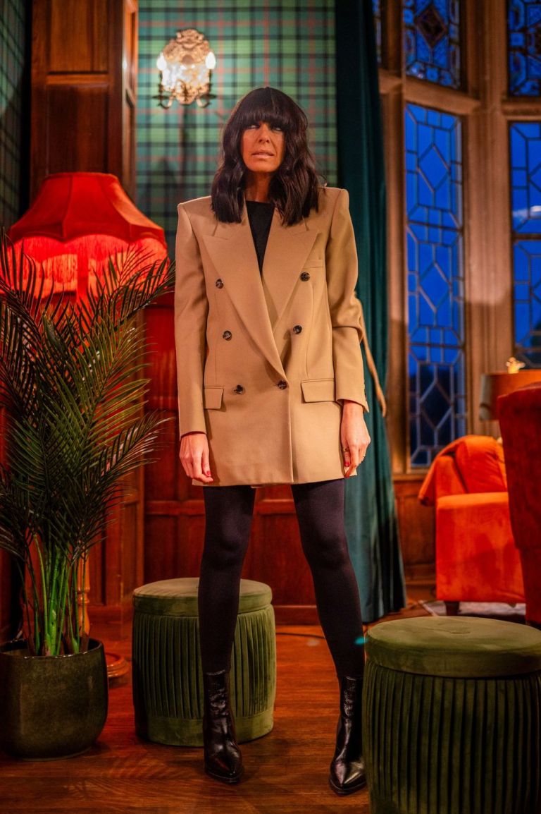 where to get all Claudia Winkleman The Traitors outfits camel blazer black leggings black ankle boots 19 January 2024 photo BBC