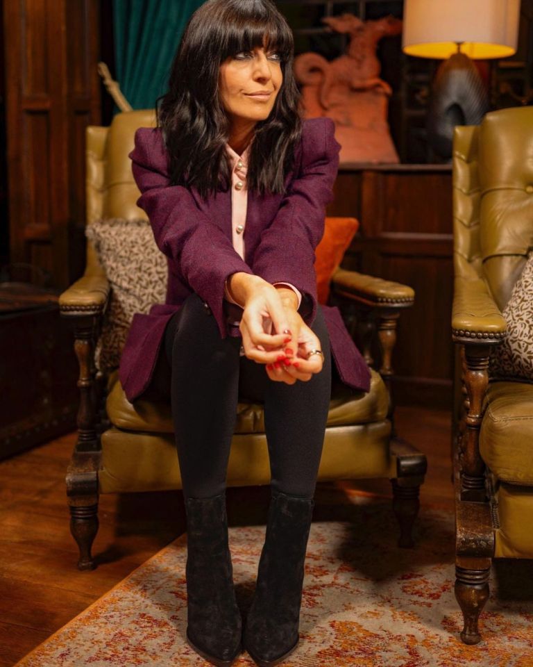 where to get all Claudia Winkleman The Traitors outfits purple tweed jacket oib=nk pearl blouse black leggings black suede ankle boots 11 January 2024 photo Mara Cullara