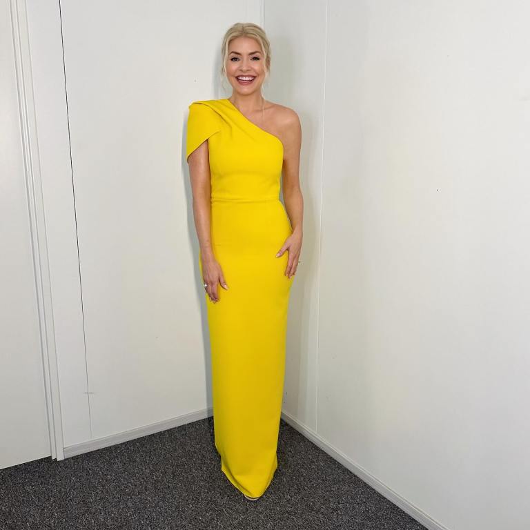 where to get all Holly Willoughby Dancing on Ice dresses canary yellow one sleeve asymmetric long dress 4 February 2024 Photo Holly Willoughby