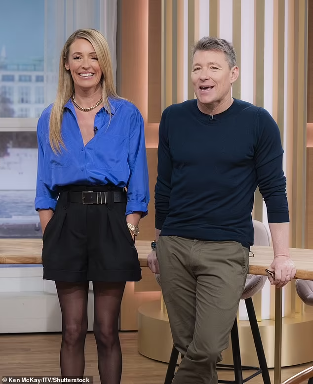 where to get all Cat Deeley this Morning outfits electric blue shirt black shorts black slingbacks 13 March 2024 Photo ITV