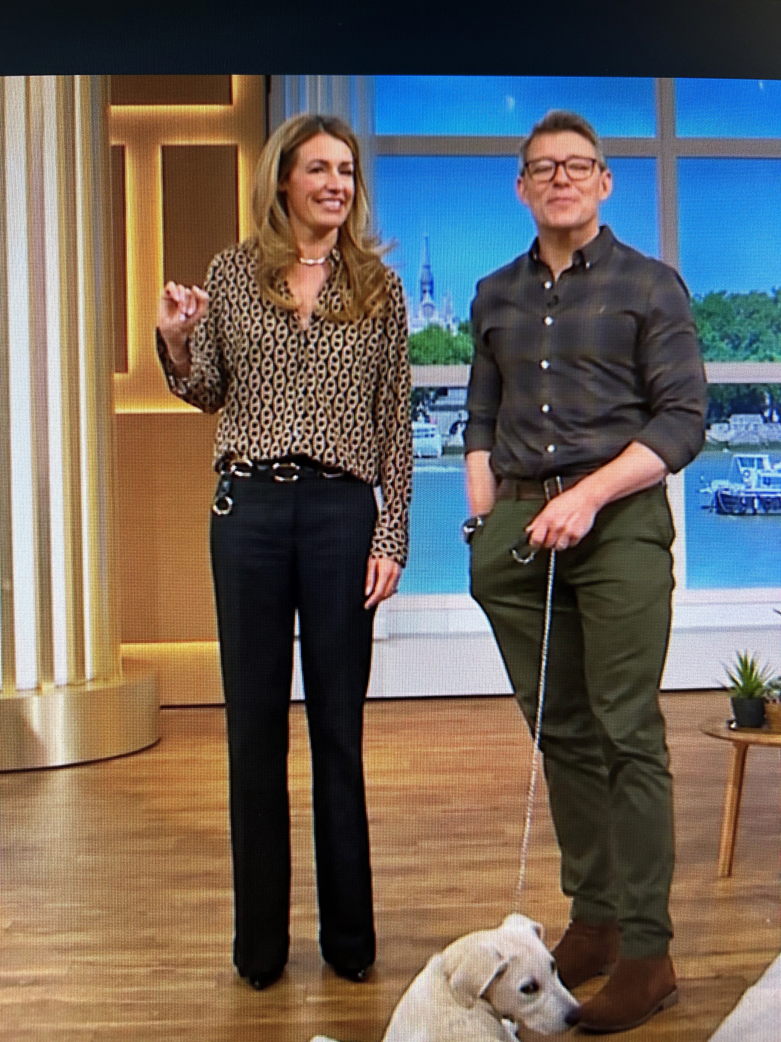 where to get all Cat Deeley This Morning outfits black and camel chain print shirt black lfared jeans black ankle boots 16 May 2024 Photo ITV