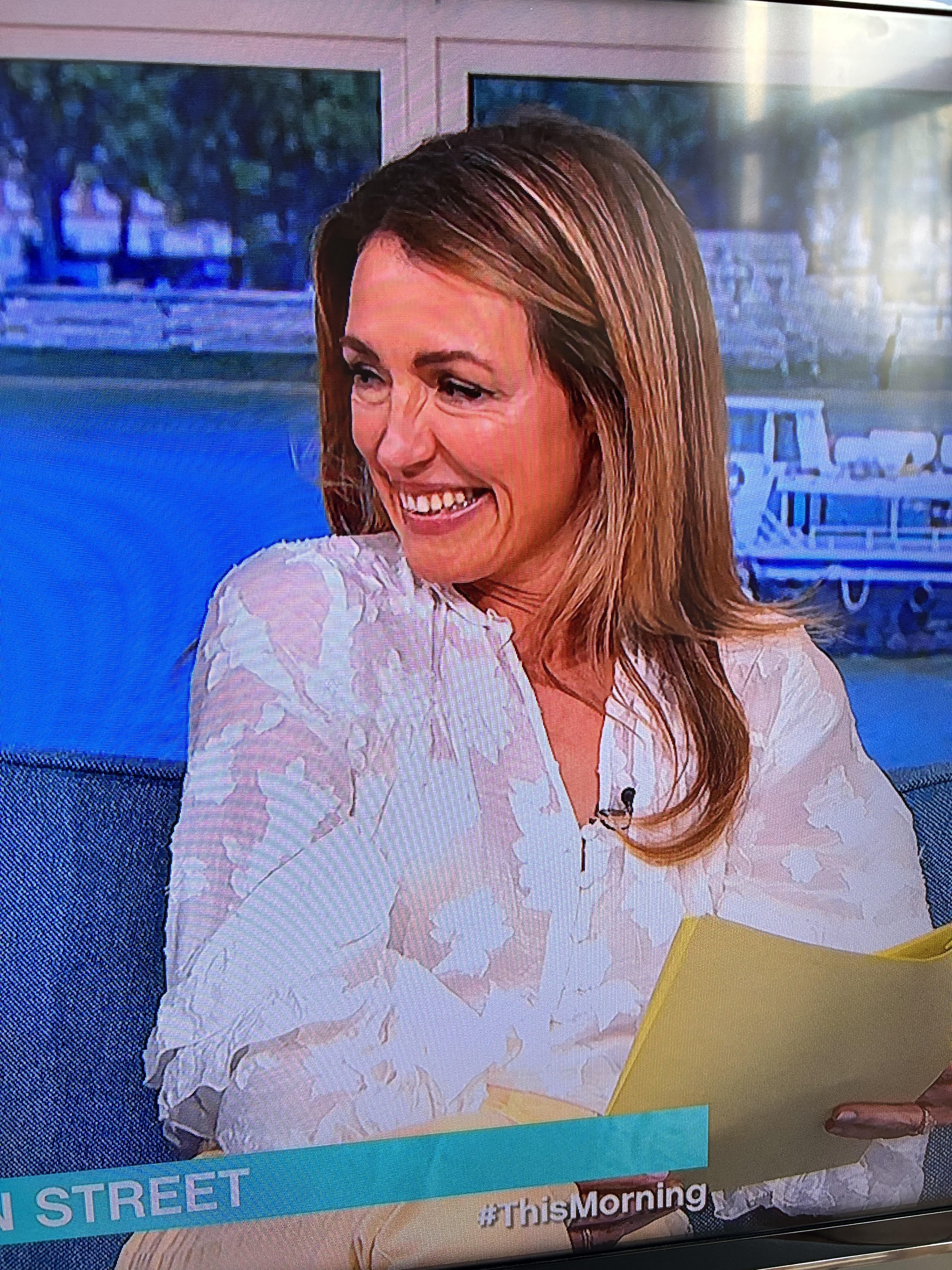 where to get all Cat Deeley This Morning outfits ivory jacquard blouse yellow jeans white snadals gold cuff gold hoops brown belt 5 June 2024 Photo ITV