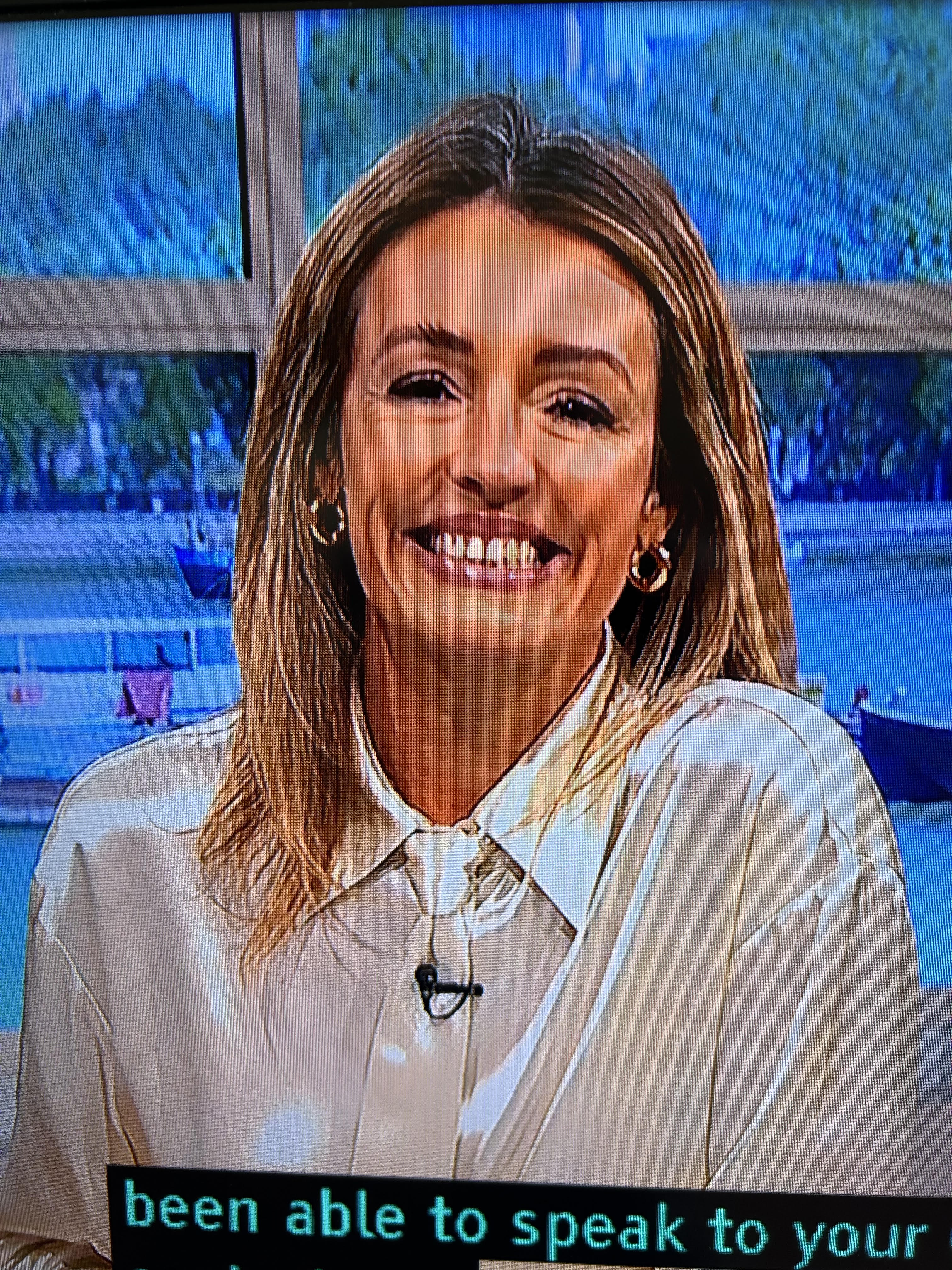 where to get all Cat Deeley This Morning outfits ivory satin shirt and tie khaki green shorts brown belt snake court shoes 3 June 2024 Photo ITV